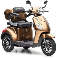 a gold scooter is parked on a white surface