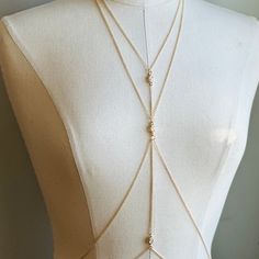 Get the best of both worlds with our Starlight Body Chain - two delicate pieces that can be worn separately or layered for a unique look. Handcrafted and shipped within 2-3 weeks, this is a must-have addition to your collection. Arwen Cosplay, Gold Body Chain Jewelry, Harness Jewelry, Body Chain Harness, Chain Harness, Gold Body Chain, Silver Bodies, Body Chains, Best Of Both Worlds