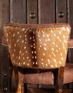 a chair with deer hides on it