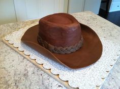 a brown hat sitting on top of a table