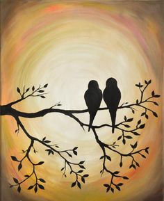 two birds are sitting on a tree branch in front of the sun with yellow and orange colors