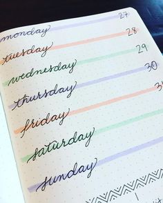 a close up of a notebook with some writing on it and the words monday written in cursive ink