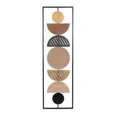 a metal and wood sculpture with three circles on it