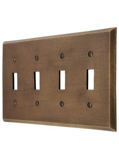 a metal switch plate with four holes