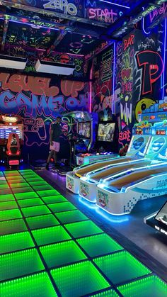 a room filled with neon lights and video games