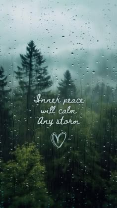 rain drops on the window and trees in the background with a quote that reads, i am