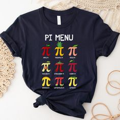 a t - shirt with the pi menu on it is shown next to some other items