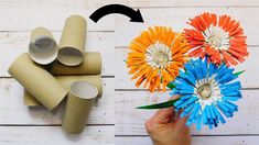 the paper flowers are being made from toilet rolls