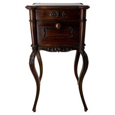 an old wooden table with drawers on one side and a drawer on the other end