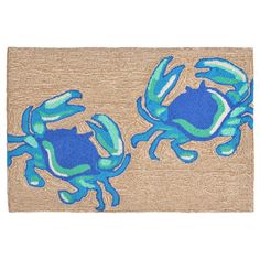 a blue crab rug on a white background