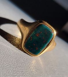 Antique Victorian Era 18K Gold Bloodstone Signet Ring. 18K gold antique bloodstone ring from the 1800s. Beautiful condition considering its age! Size 5.5- can be resized by your local jeweler. Wedding Signet Ring, Vintage Mens Rings, Victorian Rings Vintage, Historic Jewelry, Minimalist Jewelry Rings, Stone Rings For Men, Bloodstone Ring, Greek Ring, Unique Mens Rings