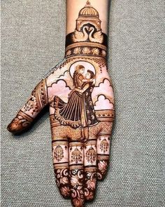 the hand is decorated with an intricate design