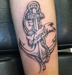 a tattoo with an anchor and the word family on it