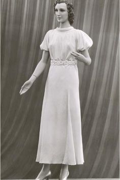 size: 24x16in Photographic Print: Twenties Female Mannequin in Long Dress by Found Image Press : Artists Female Mannequin, Day Dress, High Quality Art Prints, White Formal Dress, Day Dresses, The Twenties, Photographic Print, Long Dress, Formal Dresses