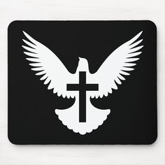 a white dove with a cross on it mouse pad