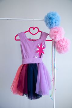 This Pinkie Pie Inspired Tutu dress is perfect for Birthday party, Halloween party and Dress up The dress is made with high quality fabrics. Top of the dress: 100% cotton fabric Bottom of the dress: High quality lycra soft tulle fabric ( soft and not stiff) Lining: 100% cotton fabric There is a corset like closing at the back of the dress which lets to adjust the fit of the dress. There is an elastic band at the back of the waistband. The dress is easy to pull on and very adjustable. This dress Princess Style Fairy Dress For Summer Costume Party, Fairytale Party Dresses, Princess Style Sleeveless Fairy Dress For Fancy Dress, Fairytale Summer Party Dresses, Summer Fairytale Party Dresses, Summer Party Dresses In Fairytale Style, Cute Purple Dress For Costume Party, Cute Sleeveless Fairy Dress For Party, Whimsical Fitted Sleeveless Princess Dress