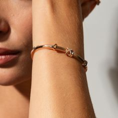 This Iconic Moving X Bangle with Diamond Pavé invites you to uncover your inner treasures through its bold and iconic design, making a definitive statement of discovery and self-expression. Accent diamonds: 0.10+ ctw, VS2+/F+ Setting: Prongs setting Rose Gold Polished 14k Gold Bracelets, Modern Rose Gold Bracelet, Rose Gold 14k Polished Bracelets, Rose Gold Fine Jewelry Bracelets With Polished Finish, Rose Gold Polished Bracelets Fine Jewelry, Rose Gold Bracelets With Polished Finish, Polished 14k Rose Gold Bracelets, Rose Gold Bracelets With Polished Finish For Everyday Luxury, Timeless Rose Gold Bracelet With Polished Finish