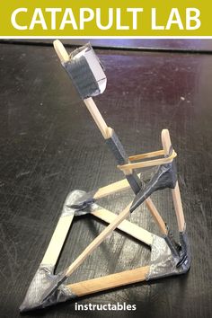 an image of a catapult made out of wood and metal with text overlay that reads, how to make a catapult lab