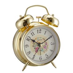 an antique style alarm clock with two bells on the front and sides, gold plated