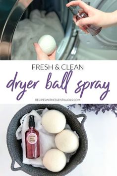 a person holding a cell phone in front of a dryer ball and soap bottle