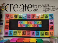 a colorful bulletin board with words written on it in front of a blackboard that says create