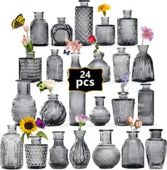 a large collection of vases with flowers in them