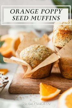 orange poppy seed muffins on a cutting board