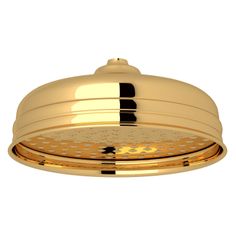 an overhead shower head with gold trim and black dots on the side, against a white background