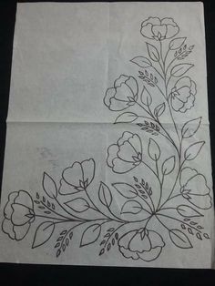 two sheets of paper with flowers drawn on them