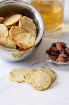 some crackers and nuts are in a bowl