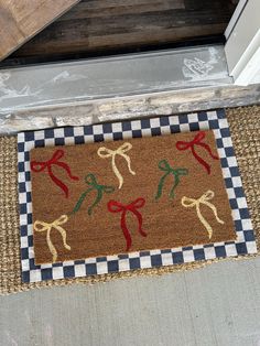 a door mat that has some scissors on it