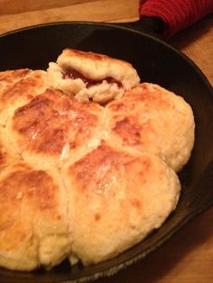 some food is cooking in a pan on the table