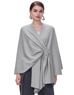 PRICES MAY VARY. Customizable Fit Design: Our women's shawl wraps feature an open front design with a matching fabric belt for a customizable fit, accommodating a variety of body types. The relaxed silhouette and asymmetrical hem create a beautifully flattering look Versatile for Any Occasion: As a chic poncho for women. This versatile piece is ideal for weddings, church services, evening events, and daily commuting. Effortlessly elevates any outfit, ensuring you always look stylish no matter the setting Wardrobe Essential: This shawl is a standout piece in your wardrobe, combining style, comfort, and versatility. Perfect for transitional seasons, it offers a light layer to chase away the chill. Drape it over a dress for an elegant evening look or pair it with your favorite jeans and boots Poncho Outfit Fall, Poncho For Women, Chiffon Coat, Poncho Outfit, White Shawl, Drape Jacket, Barley Twist, Stylish Scarves, Wedding Travel