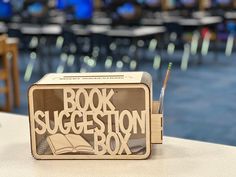 a book suggestion box sitting on top of a table