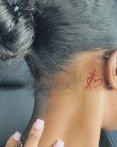 Red Behind Ear Tattoos For Women, Neck Tattoos Women Behind Ear, Red Ink Ear Tattoo, Ying Yang Tattoo Behind Ear, Cross Back Of Neck Tattoo, Cute Small Tattoos Black Women, Matching Behind The Ear Tattoos, Flower Tattoos Behind Ear, Tattoo Behind Ears For Women