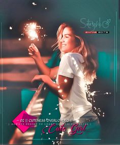 a woman holding a sparkler in her hand with the caption, she's got it