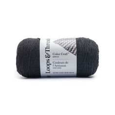 a ball of yarn that is black and white with the words color craft on it