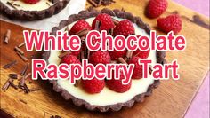 white chocolate raspberry tart on a cutting board with the words, white chocolate raspberry tart