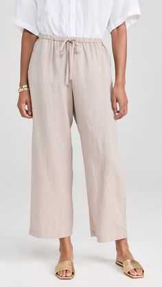 Spring Linen Pull-on Bottoms, Spring Linen Pants With Pull-on Style, Spring Linen Pull-on Pants, Linen Pull-on Style Bottoms For Loungewear, Spring Linen Pants With Drawstring, Spring Linen Drawstring Pants, Chic Linen Drawstring Bottoms, Chic Linen Pull-on Pants, Relaxed Linen Bottoms In Neutral Color