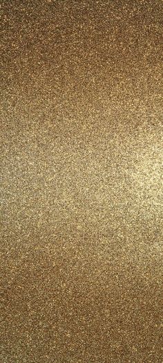 an image of gold glitter textured paper with no background or border on this page