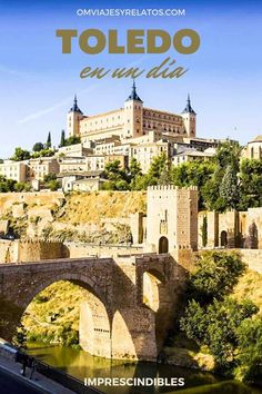 an old bridge in toledo, spain with the words impresindibles on it