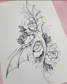 a drawing of a bat with flowers on it