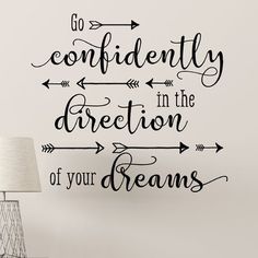 a wall decal that says, go confidently in the direction of your dreams