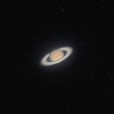 an artist's impression of the planet saturn with its rings in the dark sky