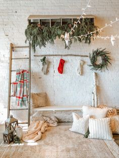 a bed with christmas decorations on the headboard and foot board in front of it