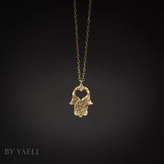 Hamsa necklace - This hammered Hamsa necklace with heart hole makes for The PERFECT protection necklace for those in your heart! More than an everyday accessory, this necklace will add depth to your jewelry box and serve as a reminder and connection to the Jewish tradition and faith. ★ Comes in our signature gift box, ready for gift giving.  ★ Available in Gold [18K goldfield & gold plated brass]  ★ Pendant size :1.15"x0.90" Thanks for shopping at ByYaeli♥  All images, texts & products are prope Hamsa Necklace Men, Hamsa Jewelry Vivien Frank Jewelry, Hamsa Hand Pendant, Hamsa Necklace Gold, Protective Charms, Hamsa Hand Jewelry, Jewelry Design Studio, Hamsa Jewelry, Jewish Jewelry