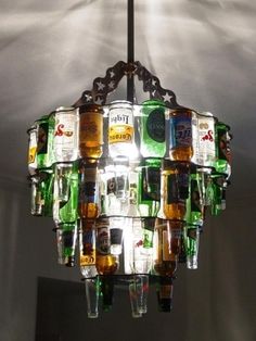 a chandelier made out of beer bottles