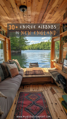 Interior of a cozy houseboat Airbnb with large windows offering a scenic view of a tranquil lake surrounded by lush greenery, one of the most unique Airbnbs in New England. Camping In New England, Cabin Vacation Ideas, Snowy Cabin In The Woods, Cottages In The Woods, Vermont Cabin, Maine Cabin, New England Living, Maine In The Fall, Unique Vacation Rentals