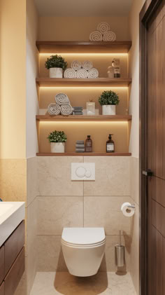 a toilet in a bathroom with shelves above it