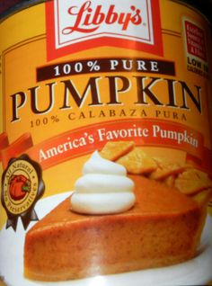 a can of pumpkin pudding with whipped cream on it's top and the label